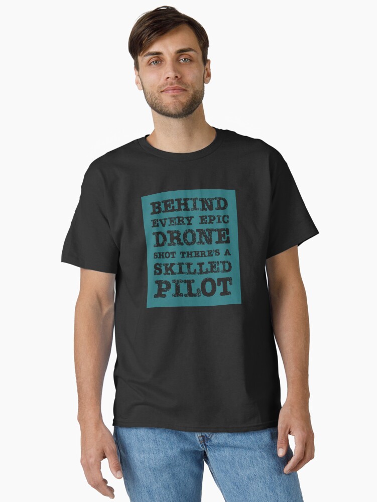 Thumbnail 1 of 7, Classic T-Shirt, Drone: Behind Every Epic Drone Shot, There's a Skilled Pilot designed and sold by Teesamust.