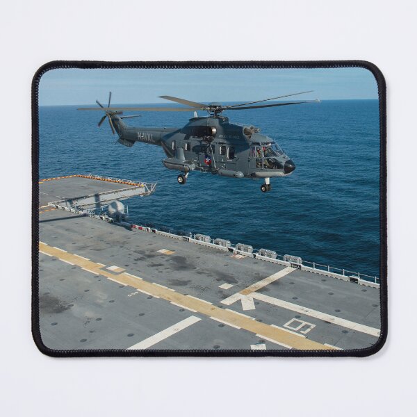 Item preview, STK109552M-A Chilean Navy helicopter prepares to land on the flight deck of USS America. designed and sold by StocktrekImages.