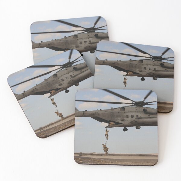 Item preview, STK109523M-Pararescuemen disembark from a CH-53 Super Stallion helicopter. designed and sold by StocktrekImages.