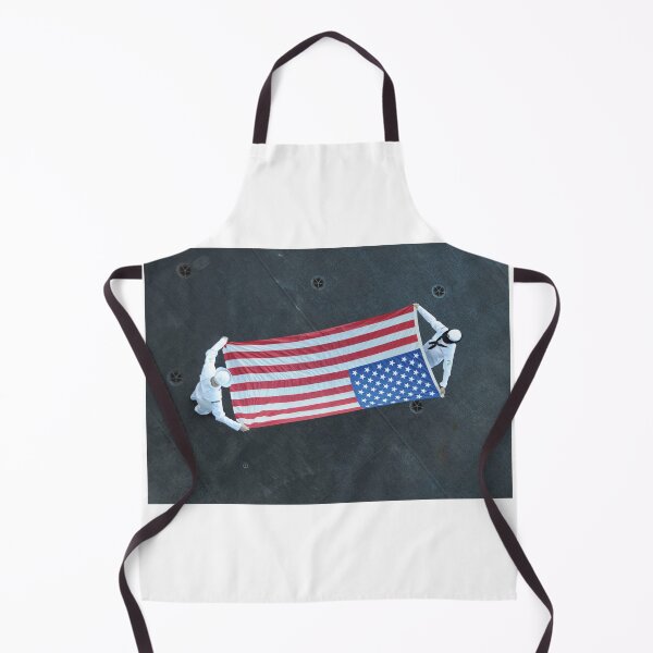 Item preview, STK109498M-Aviation Ordnancemen fold the American flag aboard USS Theodore Roosevelt. designed and sold by StocktrekImages.