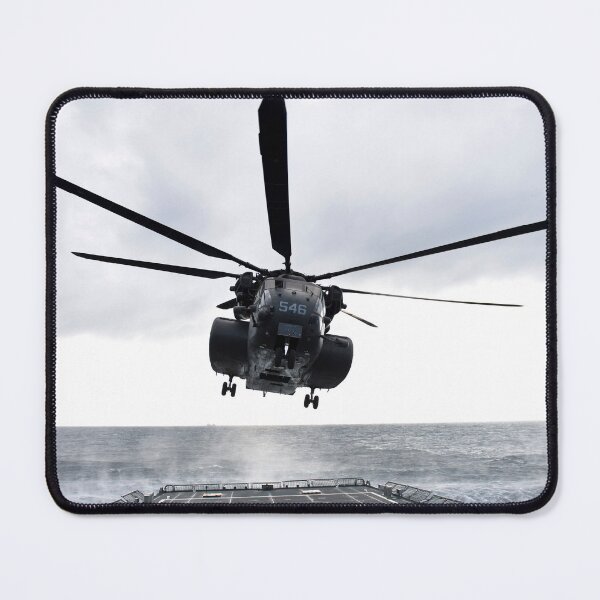 Item preview, STK109483M-An MH-53E Sea Dragon helicopter prepares to land on the flight deck. designed and sold by StocktrekImages.