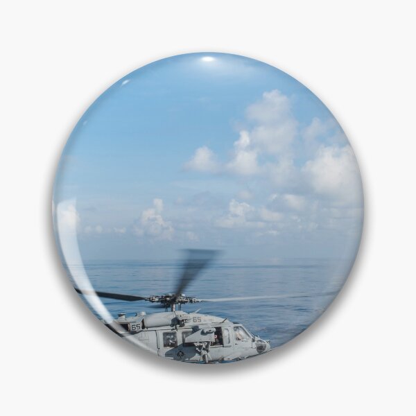 Item preview, STK109467M-An MH-60S Sea Hawk helicopter departs the flight deck of USS Essex. designed and sold by StocktrekImages.