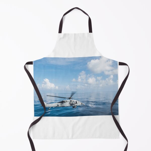Item preview, STK109467M-An MH-60S Sea Hawk helicopter departs the flight deck of USS Essex. designed and sold by StocktrekImages.
