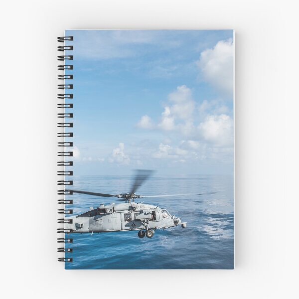 Item preview, STK109467M-An MH-60S Sea Hawk helicopter departs the flight deck of USS Essex. designed and sold by StocktrekImages.