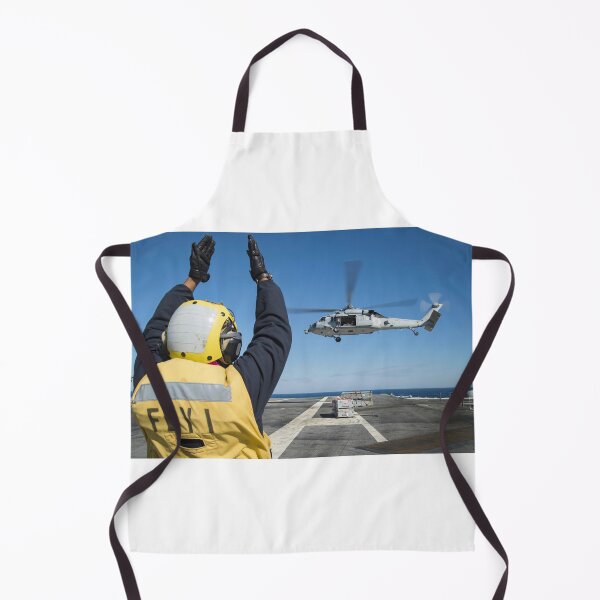 Item preview, STK109427M-Aviation Boatswain's Mate directs an MH-60S Sea Hawk helicopter. designed and sold by StocktrekImages.