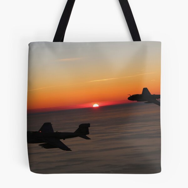 Item preview, STK109377M-Two EA-6B Prowlers are silhouetted by a setting sun. designed and sold by StocktrekImages.