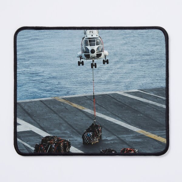 Item preview, STK109449M-An SA 330 Puma helicopter transports supplies to USS Theodore Roosevelt. designed and sold by StocktrekImages.