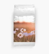 Colorful sunset with flowers Duvet Cover
