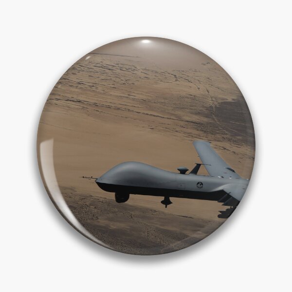 Item preview, STK109309M-An umanned aerial vehicle conducts airdrop operations. designed and sold by StocktrekImages.