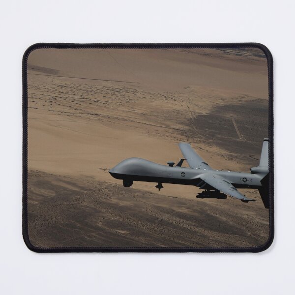 Item preview, STK109309M-An umanned aerial vehicle conducts airdrop operations. designed and sold by StocktrekImages.