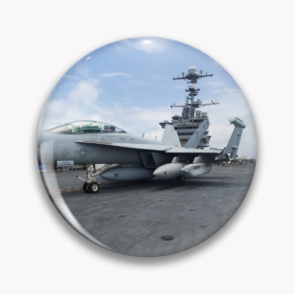 Item preview, STK109298M-Chief Aviation Boatswain's Mate directs an EA-18G Growler. designed and sold by StocktrekImages.