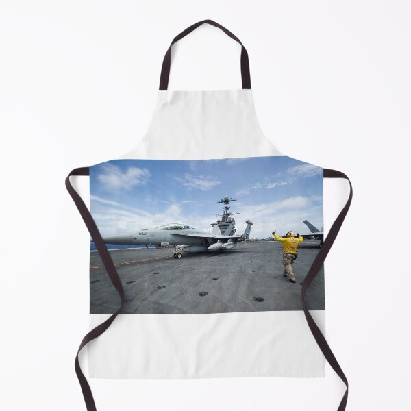 Item preview, STK109298M-Chief Aviation Boatswain's Mate directs an EA-18G Growler. designed and sold by StocktrekImages.