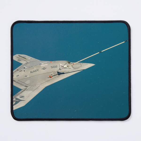 Item preview, STK109259M-The Navy's unmanned X-47B receives fuel from an Omega K-707 tanker. designed and sold by StocktrekImages.