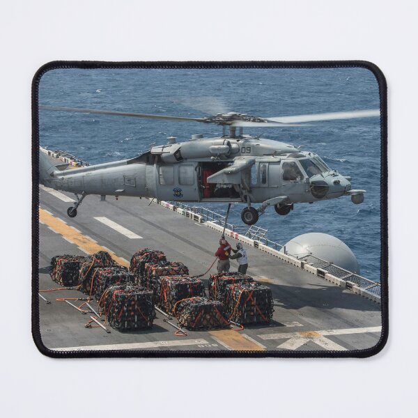 Item preview, STK109228M-An MH-60S Seahawk lifts pallets of ammunition. designed and sold by StocktrekImages.