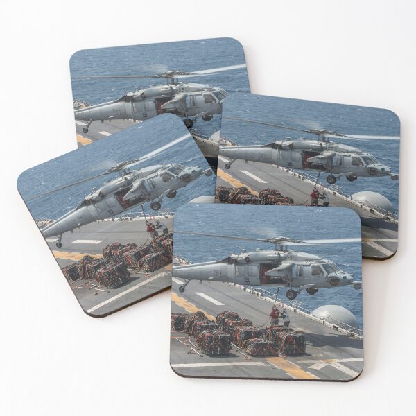 Item preview, STK109228M-An MH-60S Seahawk lifts pallets of ammunition. designed and sold by StocktrekImages.