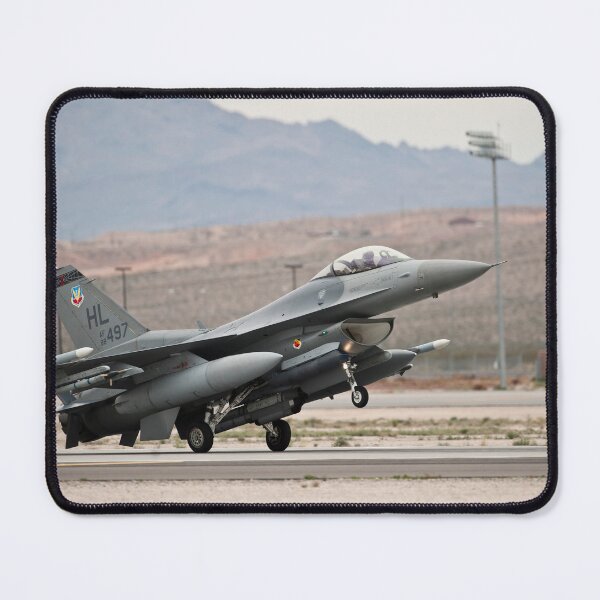 Item preview, STK109211M-An F-16 Fighting Falcon landing at Nellis Air Force Base, Nevada.  designed and sold by StocktrekImages.