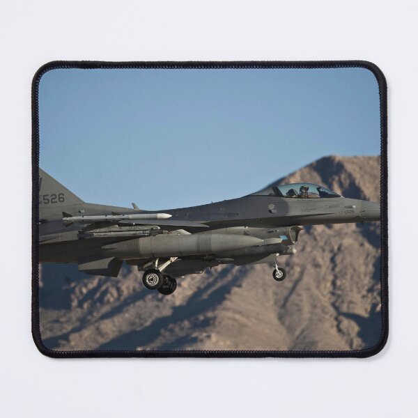 Item preview, STK109179M-An F-16 Fighting Falcon approaches the runway for landing. designed and sold by StocktrekImages.