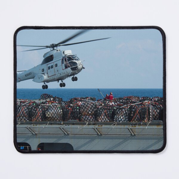 Item preview, STK109161M-Cargo is being attached to an AS-332 Super Puma helicopter. designed and sold by StocktrekImages.