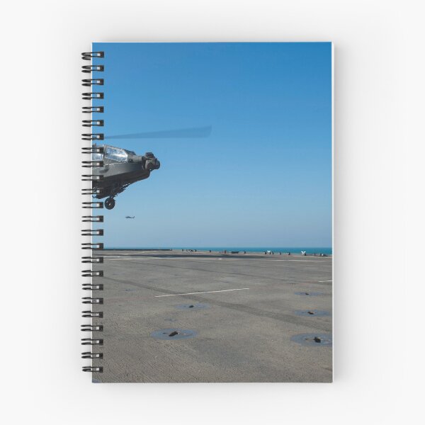 Item preview, STK109149M-Boatswain's Mate signals an Apache helicopter on the flight deck of USS Comstock. designed and sold by StocktrekImages.