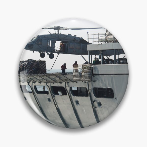 Item preview, STK109133M-An MH-60S Seahawk helicopter transports cargo. designed and sold by StocktrekImages.