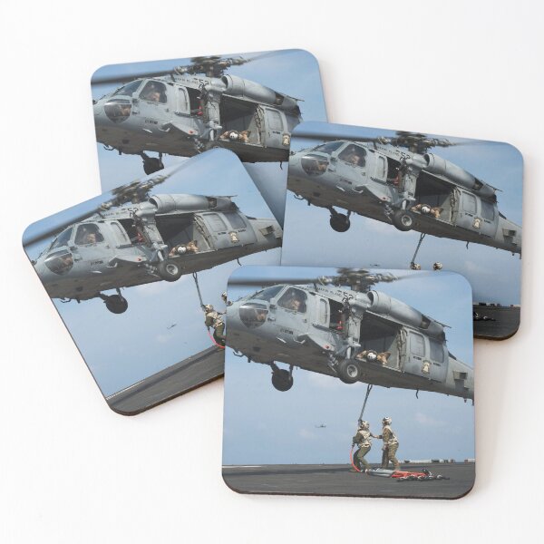 Item preview, STK109130M-Marines secure a hoist sling to an MH-60S Seahawk helicopter. designed and sold by StocktrekImages.