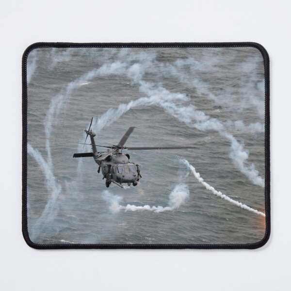 Item preview, STK109121M-An HH-60 Pavehawk helicopter testing the aircraft's defensive systems. designed and sold by StocktrekImages.