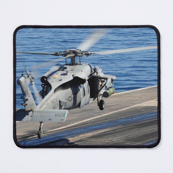Item preview, STK109061M-An MH-60S Seahawk helicopter lands on the flight deck of USS George H.W. Bush. designed and sold by StocktrekImages.