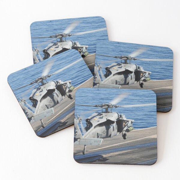 Item preview, STK109061M-An MH-60S Seahawk helicopter lands on the flight deck of USS George H.W. Bush. designed and sold by StocktrekImages.
