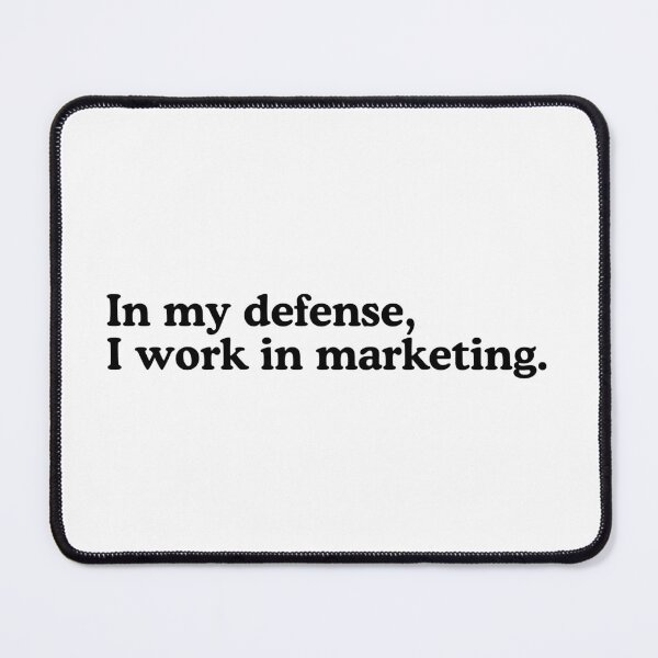 Vista previa del artículo con la obra «In my defense, I work in marketing.», diseñado y vendido por Toad House Pixels.