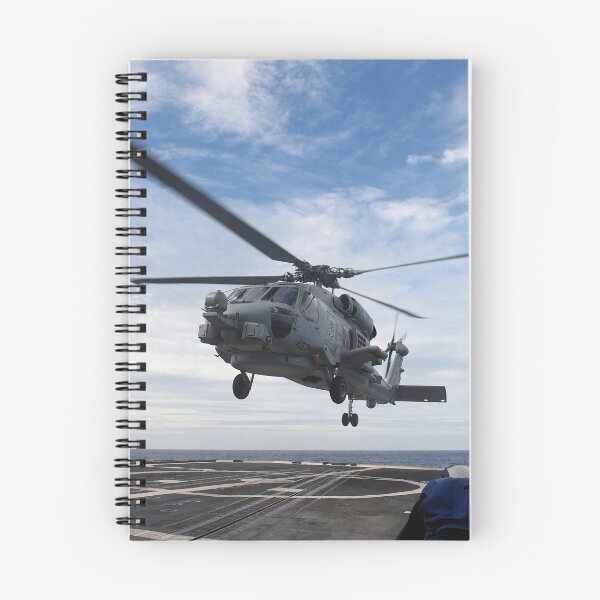 Item preview, STK109030M-Seaman prepares to secure a helicopter to the flight deck aboard USS Vicksburg. designed and sold by StocktrekImages.