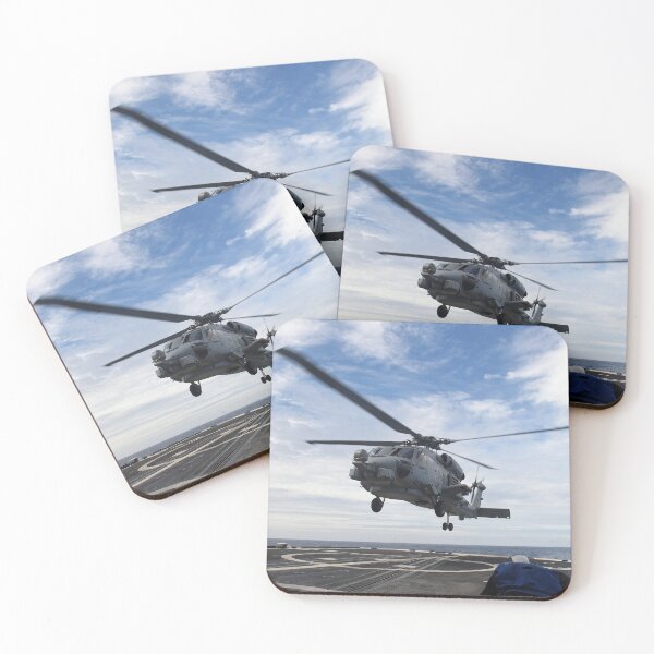 Item preview, STK109030M-Seaman prepares to secure a helicopter to the flight deck aboard USS Vicksburg. designed and sold by StocktrekImages.
