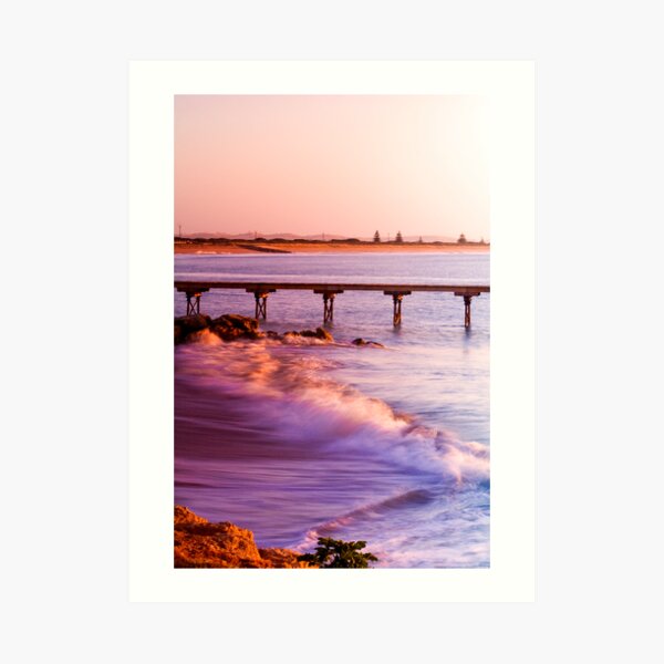 Crashing waves as the sun rises at Beachport Art Print