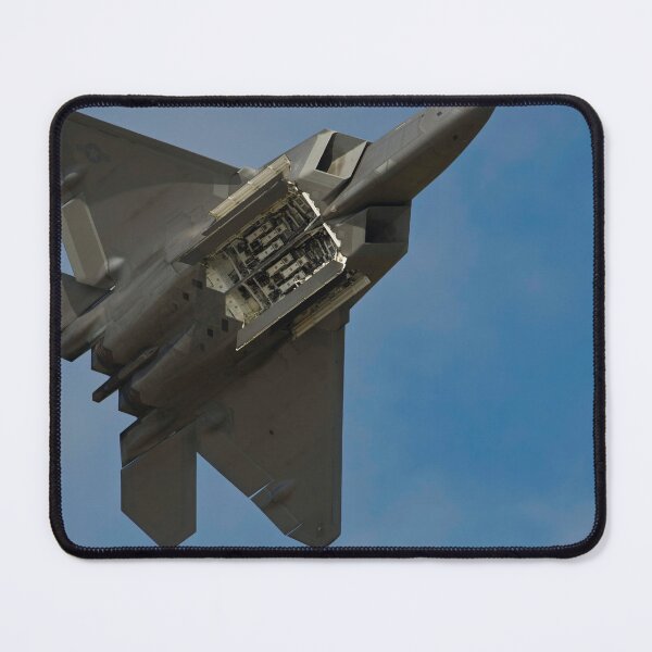 Item preview, STK108961M-An F-22 Raptor displays its weapons bays. designed and sold by StocktrekImages.