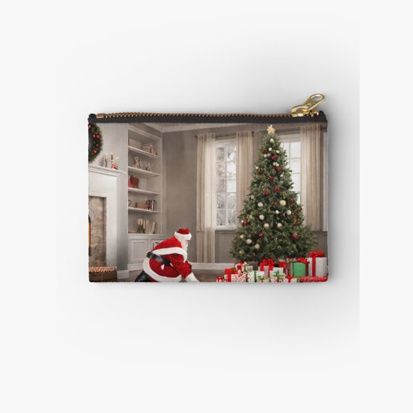 Item preview, Santa Claus placing gifts under a Christmas tree inside a home. Fireplace burning,  designed and sold by DeJuin.