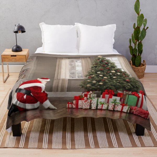 Item preview, Santa Claus placing gifts under a Christmas tree inside a home. Fireplace burning,  designed and sold by DeJuin.