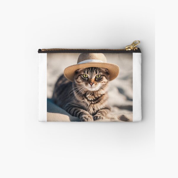 Item preview, Kitten with hat lying on the sand at the beach designed and sold by NaturaFotos.