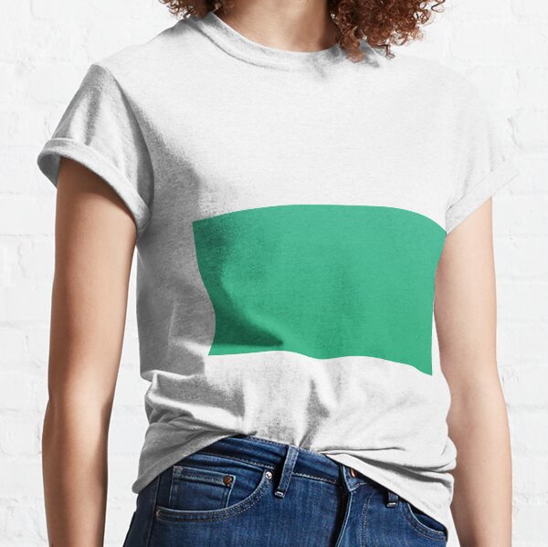 blusa verde esmeralda con jeans