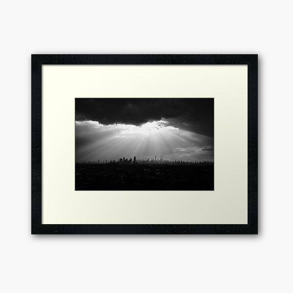 God Rays Over Manhattan Skyline Framed Art Print