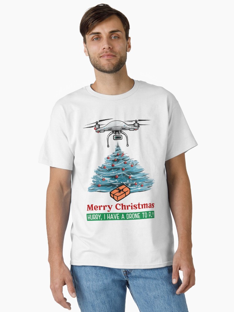 Thumbnail 1 of 7, Classic T-Shirt, Merry Christmas: Hurry, I Have a Drone To Fly designed and sold by Teesamust.