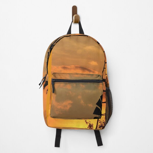 Item preview, Golden Sky at Sunset in Kansas with a Windmill silhouette designed and sold by ROBERTDBROZEK.