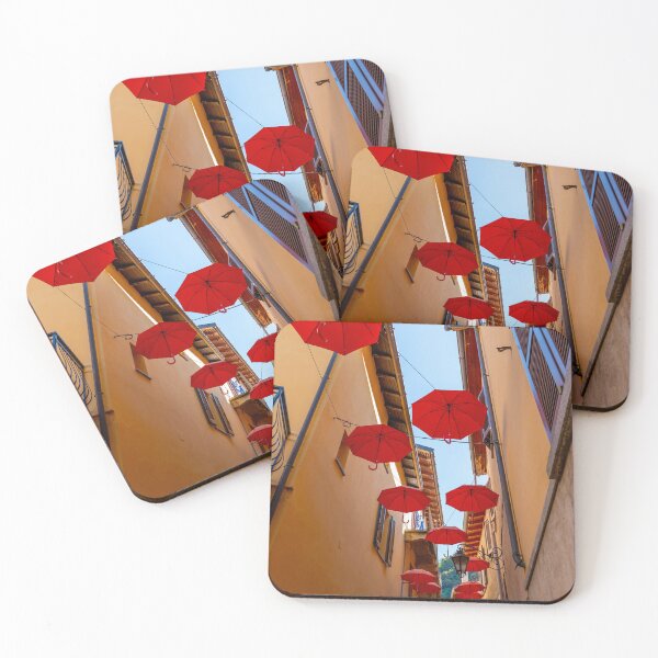 Item preview, City Street in Porto Ceresio with Hanging Umbrellas in a Sunny Summer Day designed and sold by Mats Silvan.