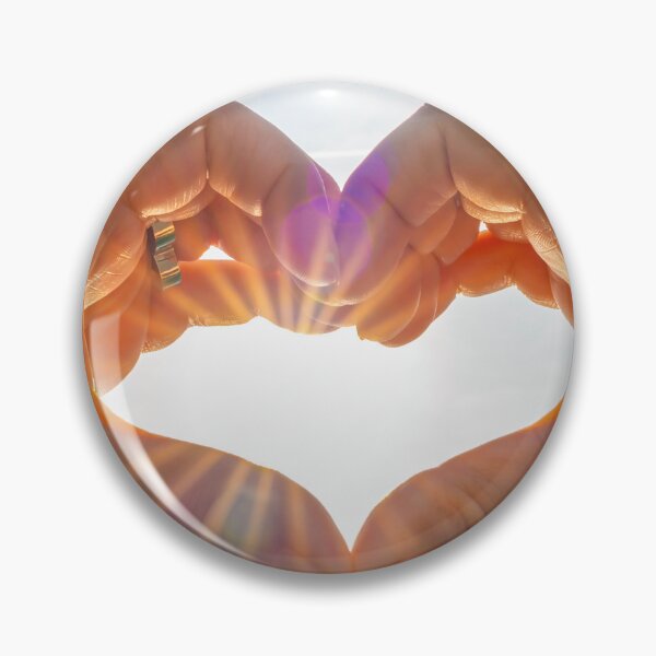 Item preview, Hands Making a Heart Shape Against the Sky with Sunbeam designed and sold by Mats Silvan.