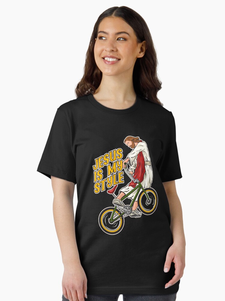 Thumbnail 1 of 7, Essential T-Shirt, Christ on a Bike - BMX Jesus designed and sold by ChristlikeMerch.