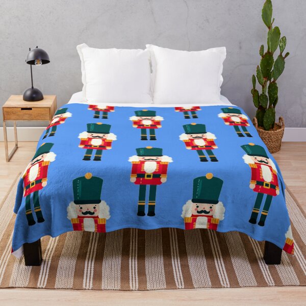 Item preview, Red and Green Christmas Nutcracker Toy Soldier Graphic Art - Light Blue Background designed and sold by Star-Fragment.