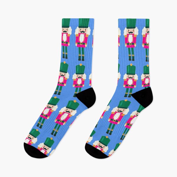 Item preview, Pink and Green Christmas Nutcracker Toy Soldier Graphic Art - Light Blue Background designed and sold by Star-Fragment.