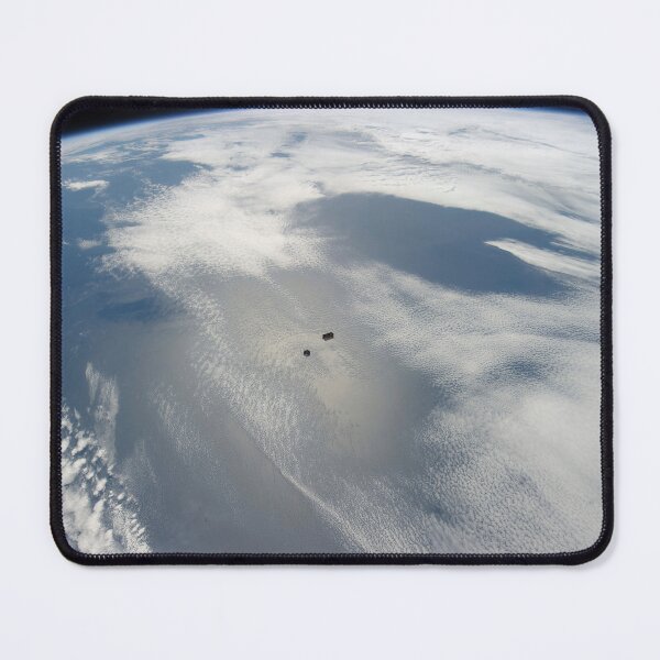 Item preview, STK204192S-Tiny satellites backdropped by a blue and white part of Earth. designed and sold by StocktrekImages.