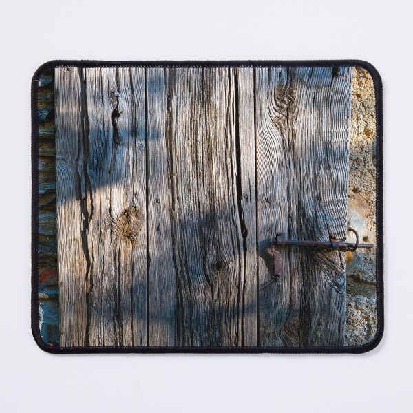 Item preview, Beautiful Old Wood Door on a Stone Wall with Sunlight designed and sold by Mats Silvan.