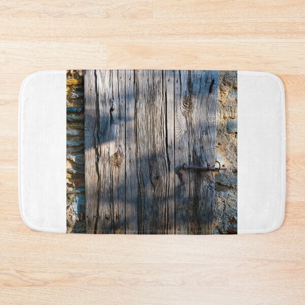 Item preview, Beautiful Old Wood Door on a Stone Wall with Sunlight designed and sold by Mats Silvan.