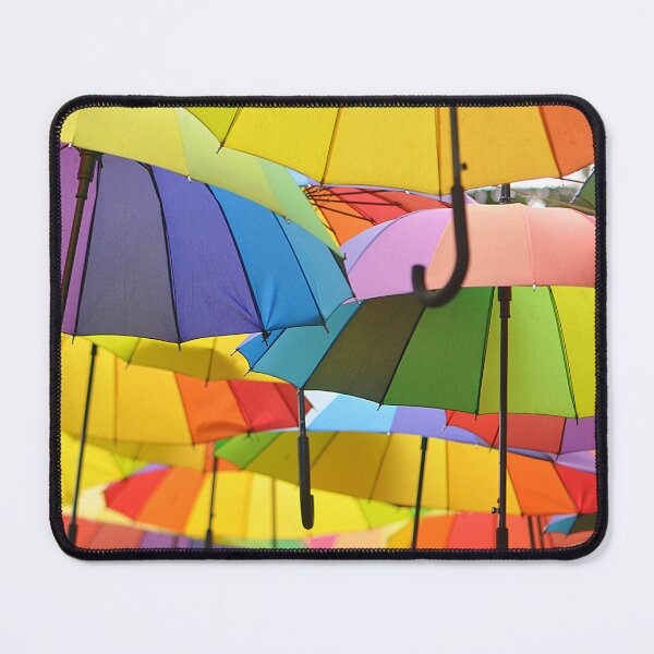 Item preview, A collection of rainbow umbrellas strung up and flying  designed and sold by IPPhotography.