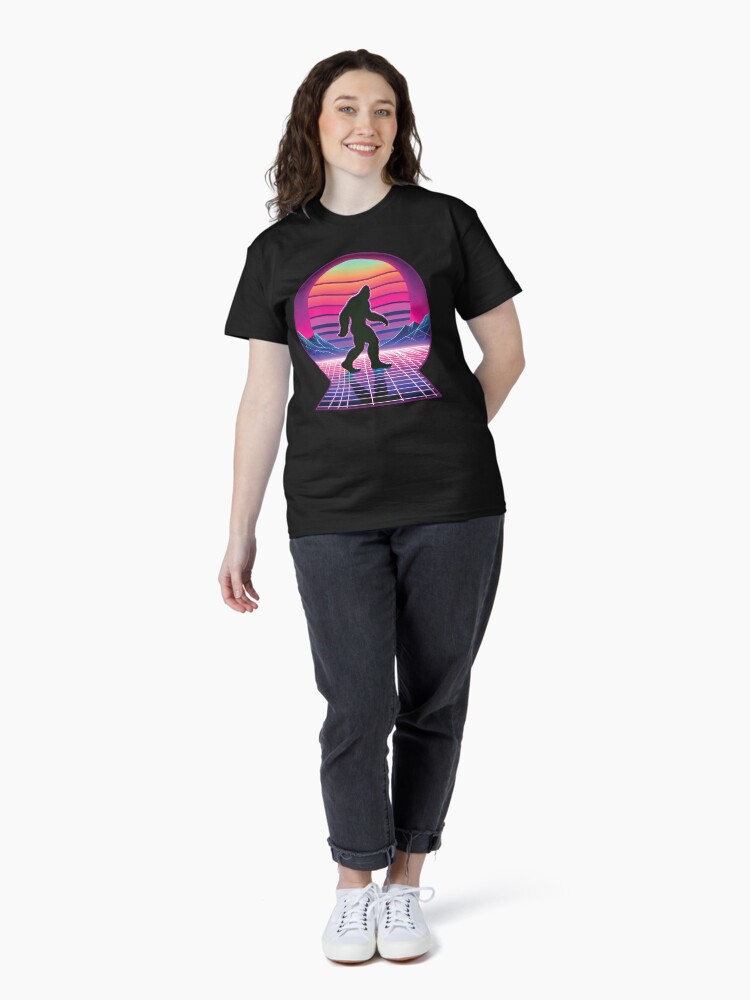 Thumbnail 4 of 7, Classic T-Shirt, Retro Synthwave Bigfoot Silhouette - Neon Sunset Art designed and sold by hidden-design.